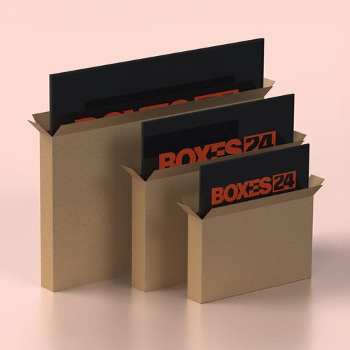 Three TV cardboard boxes with 'BOXES24' branding on a pink background