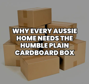 stack of plain cardboard boxes with text 